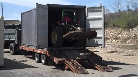 moving containers around tractor